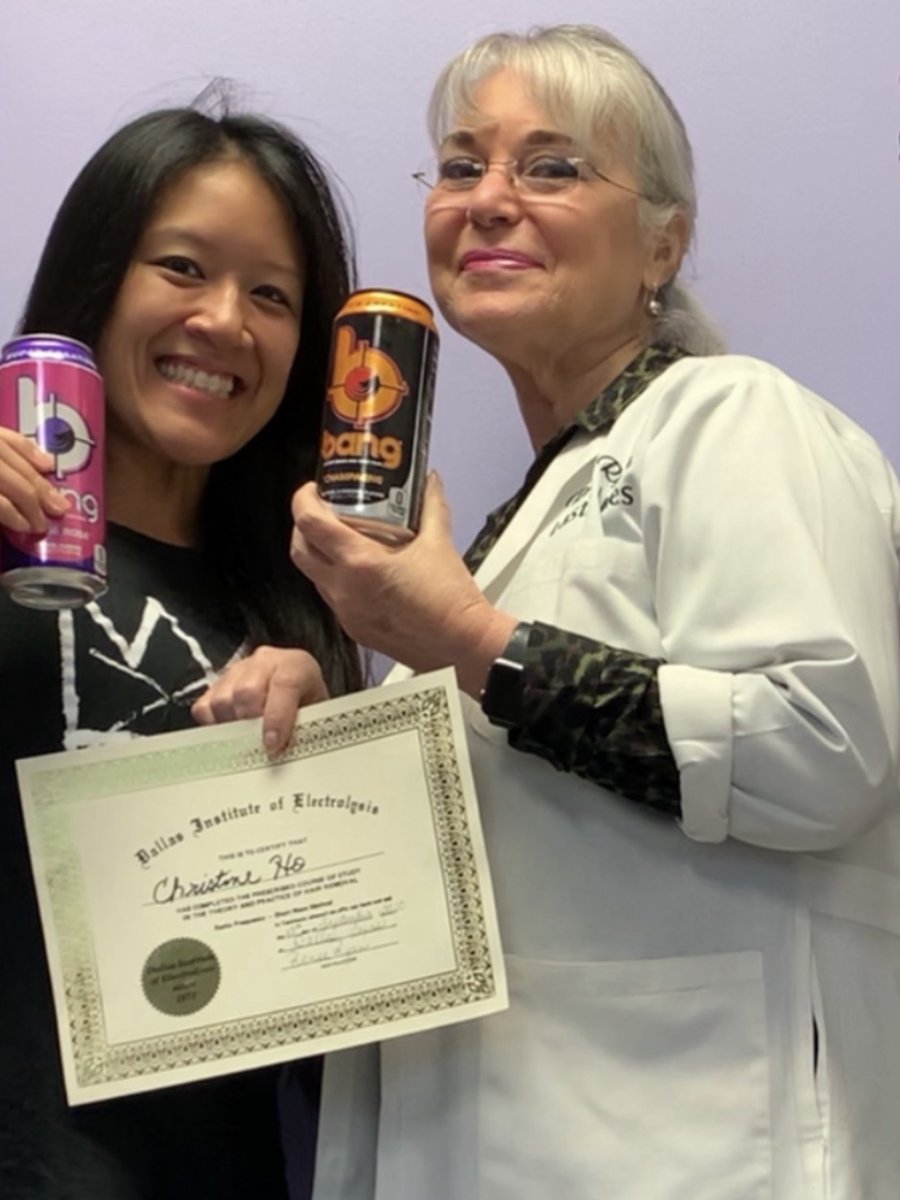 Graduate of the Dallas Institute of Electrolysis holding her certificate with Renee Ryan
