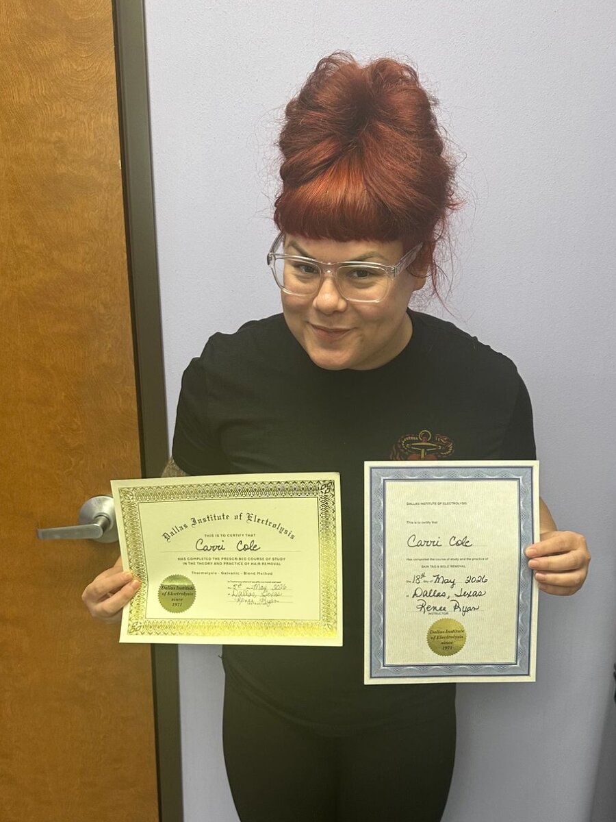 Graduate of the Dallas Institute of Electrolysis holding her electrolysis and skin tag and mole removal certificates